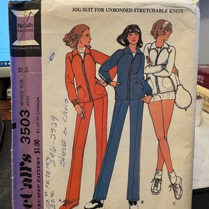 May include: Vintage McCall's 3503 sewing pattern for a Misses' jog suit or sport jacket and racket cover. The pattern features illustrations of the jog suit in orange, blue, and white. The pattern includes the text "JOG SUIT FOR UNBONDED STRETCHABLE KNITS".