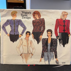 May include: A vintage sewing pattern for a women's jacket. The pattern is from Vogue's Basic Design and features five different styles of jackets. The pattern number is 1219.