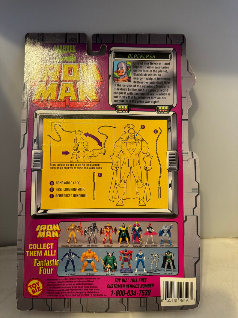 May include: A plastic action figure of Blacklash from the Marvel Comics universe. The figure is posed with a whip in his right hand and a cape flowing behind him. The figure is part of the Iron Man toy line. The back of the packaging features a description of the character and a list of other figures in the line.