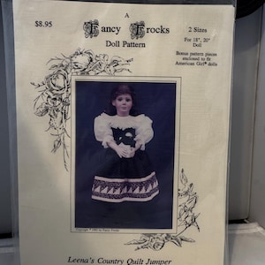 May include: A doll pattern for a country quilt jumper, designed for 18-inch or 20-inch dolls. The pattern includes bonus pieces for American Girl dolls. The pattern is titled "Leena's Country Quilt Jumper 2010".