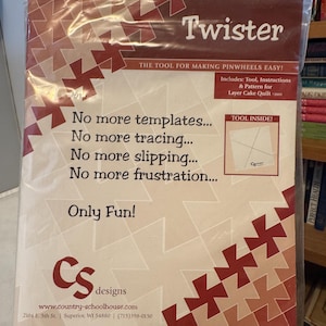 May include: A quilting tool package named "Twister" with a geometric red and tan pattern. The text on the package says "No more templates... Only Fun!" and includes the CS designs website address.