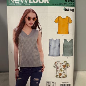 May include: A sewing pattern for a sleeveless top with a V-neck. The pattern includes three different styles: a striped top, a polka dot top, and a floral print top. The pattern is labeled "New Look" and "Easy" and has the number 6543.
