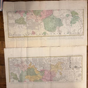 May include: A vintage map of Europe, printed on two sheets of paper, showing the political divisions of the continent in the 18th century. The map is in black and white with hand-colored borders and text.