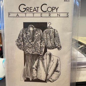 May include: A black and white illustration of a jacket pattern. The pattern is for a blanket jacket. The pattern is from Great Copy Patterns and is number #805.