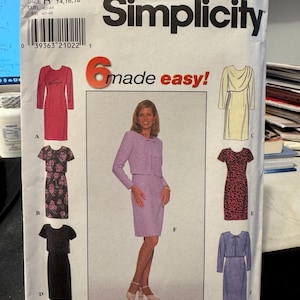May include: A sewing pattern for six different dresses, including a dress with a jacket, a dress with a cowl neck, and a dress with a floral print. The pattern is for sizes 14, 16, and 18. The pattern is from Simplicity and is labeled "made easy!"