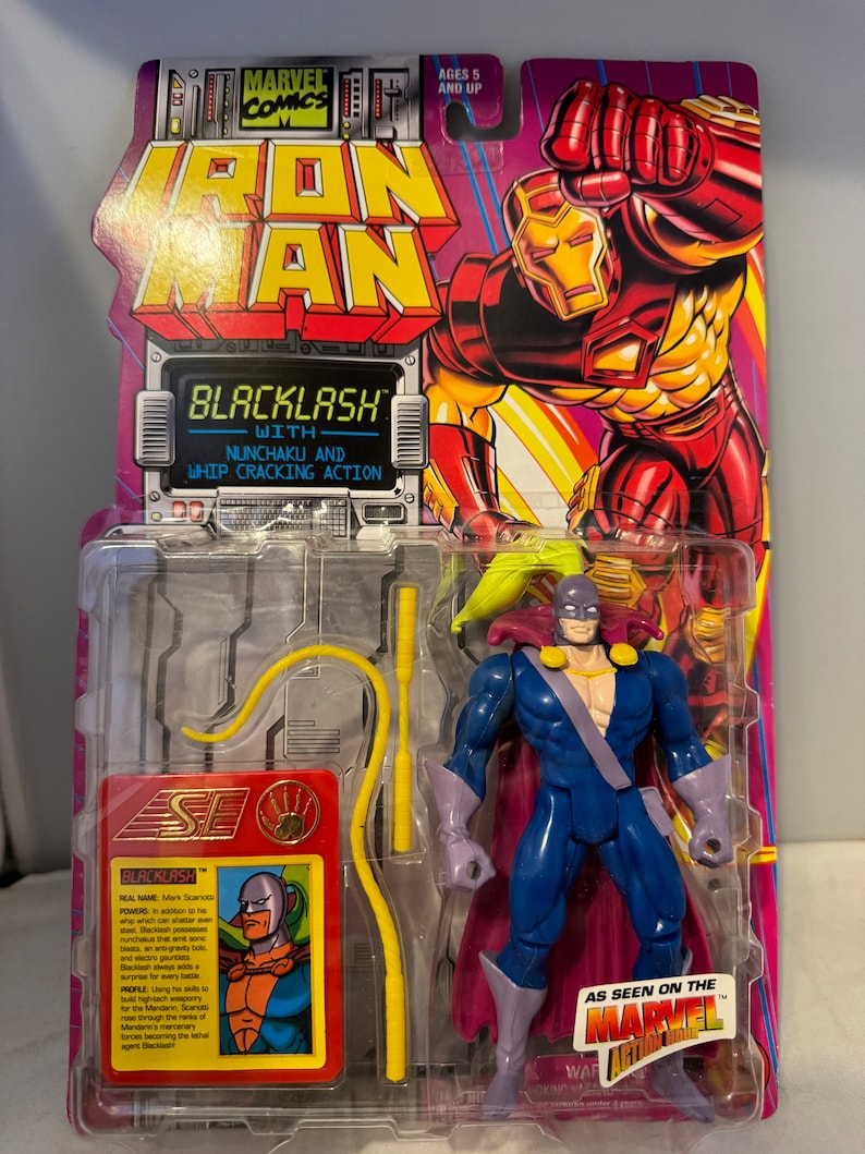 May include: Blacklash action figure from the Marvel Comics Iron Man series. The figure is wearing a blue and purple costume with a yellow whip. The packaging features a red and yellow Iron Man illustration and the text "Blacklash with Nunchuku and Whip Cracking Action".