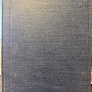 May include: A dark blue hardcover book with a textured cover.