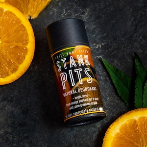 Our natural, baking soda-free deodorant is shown propped with orange slices and packaged in a 2 oz paper tube that's fully compostable. Magnesium-based, this natural deodorant is a simple, effective choice for sensitive skin.