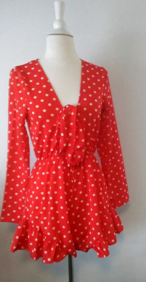 red and white polka dot jumpsuit