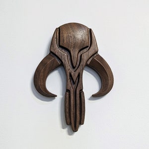 Mythosaur Signet Pin Carving from Mandalorian made out of Walnut