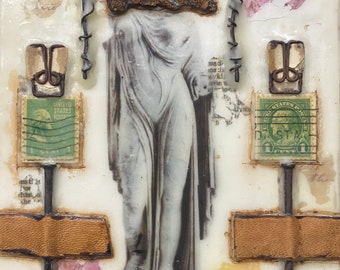 Collaged Woman Image Mini Symbolic Encaustic Painting with rusted little items and other found objects.