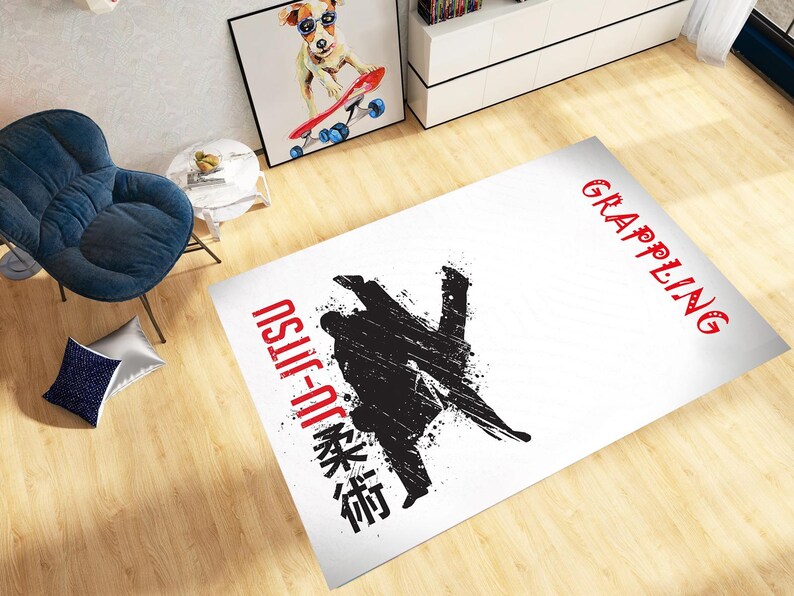 May include: White rectangular rug with a black and red Jiu-Jitsu design. The rug features a stylized silhouette of two grappling figures, with the words "Jiu-Jitsu" and "Grappling" in red and black.