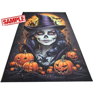 May include: A Halloween rug featuring a witch with skull makeup, a purple witch hat, and long black hair. The rug also includes carved pumpkins and a full moon in the background. The word "SAMPLE" is stamped in the upper left corner.