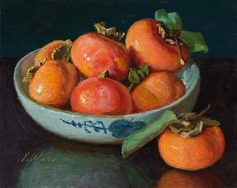 May include: Oil painting of a bowl filled with ripe persimmons. The fruit is a vibrant orange-red hue, contrasted by the light blue and white bowl with a floral design. Green leaves and stems add detail to the composition. The artist's signature is visible.