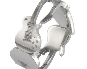 The Axes Titanium Guitar Ring