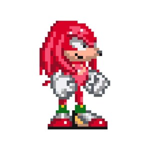 Puede incluir: Un personaje pixelado rojo y blanco con un mohawk rojo puntiagudo, guantes blancos y zapatos verdes. El personaje está de pie con los brazos cruzados y tiene una expresión seria.