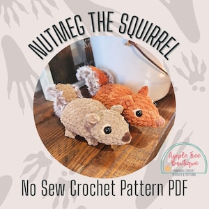 Peut inclure: Un patron de crochet pour un jouet en peluche écureuil brun et orange. Le patron s'appelle "Nutmeg the Squirrel" et est un patron de crochet PDF sans couture. Le patron est disponible chez Apple Free Boutique.