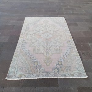 Handmade Wool Oushak Rug: 5x8 Vintage Turkish Area Rug