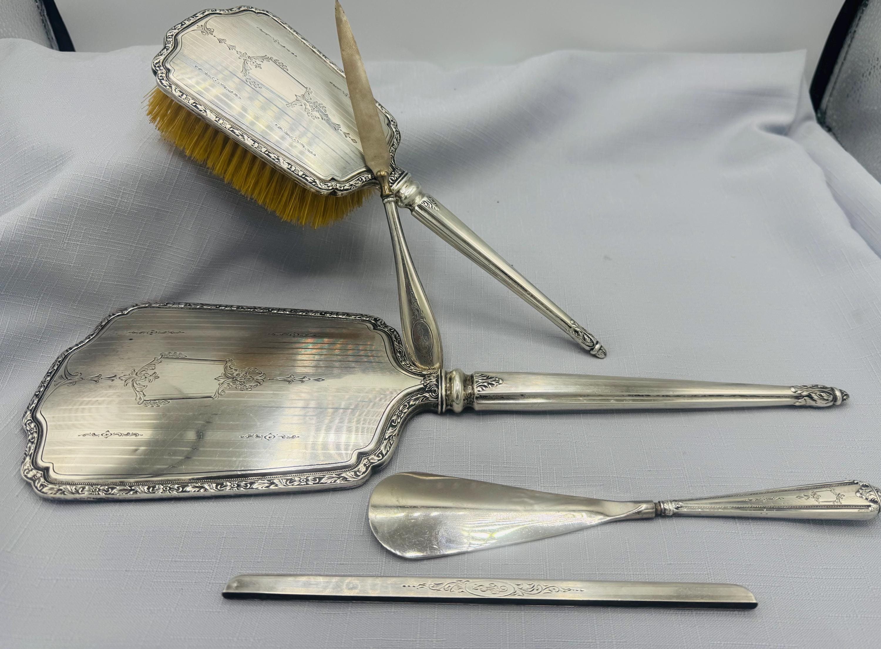 birks sterling silver dresser set Birks sterling silver dresser set including hand mirror, hairbrush and comb plus a pair of inlaid mo