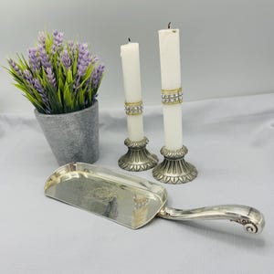 Decorative Vintage Utensil, Crumb Scoop, featuring an embossed coat of arms handled  Scoop, SilverPlate,  Gladwin Sheffield.