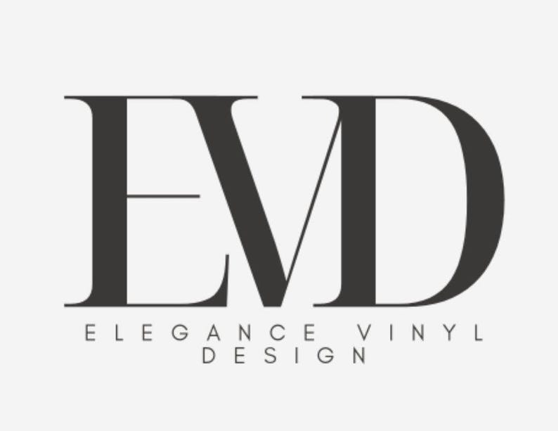 May include: A logo featuring the letters E, V, and D in a dark gray color. Below the letters, the words "ELEGANCE VINYL DESIGN" are written in a smaller, gray font. The background is a light gray.