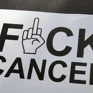 May include: Black and white sticker with the text "F**K CANCER" and a middle finger emoji.