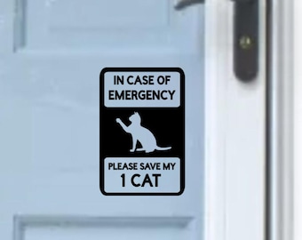 May include: A black and white rectangular sign with the text "IN CASE OF EMERGENCY" above a silhouette of a cat reaching up. Below the cat is the text "PLEASE SAVE MY 1 CAT".