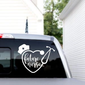 May include: White vinyl decal of a heart with a stethoscope and a nurse's cap. The text "future nurse" is inside the heart.
