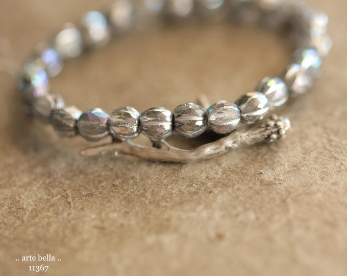 New .. SILVERED RAINBOW GLITZ 6mm .. 25 Premium Czech Glass Faceted Melon Beads (11367-st) .. jewelry supplies