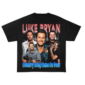 May include: Black t-shirt with a vintage-style graphic featuring Luke Bryan and the text "Luke Bryan Country Song Game On Tour".