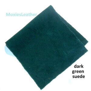 May include: A piece of dark green suede fabric. MoxiesLeather.
