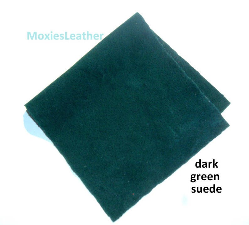 May include: A piece of dark green suede fabric. MoxiesLeather.