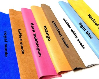 May include: A variety of suede fabric swatches in different colors, including hot pink, royal blue, toffee, dark bubblegum, mango, chestnut, winter white, light blue, and apricot.