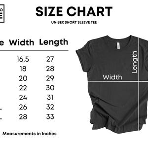 May include: A black unisex short sleeve tee shirt with a size chart. The chart shows measurements in inches for sizes XS to 3XL. The width measurements range from 16.5 to 28 inches, and the length measurements range from 27 to 33 inches.