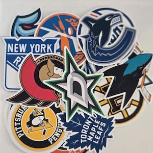 Paquete de pegatinas UV DTF de equipos de hockey de la NHL (32 equipos), 2 x 2 pulgadas.