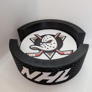 Specialtillverkade NHL-underlägg med hållare för underlägg