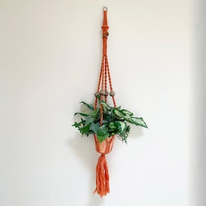 Vintage 70s Wood Beaded 52” Macrame Hanging Planter Pot Hanger Large Rust Orange Fringe