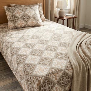 May include: A set of three ceramic mugs with a speckled, matte finish. Each mug features a different color: light blue, cream, and gray. The mugs have a simple, modern design and a comfortable handle.