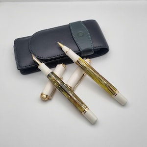 Pelikan Souveran M400 Fountain Pen and Rollerball Set, In White and Tortoiseshell finish. Superb Condition. Incudes Pelikan Carry Case.