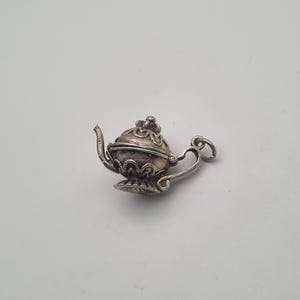 Vintage mechanical &quot;Teapot&quot; sterling silver charm for a charm bracelet.