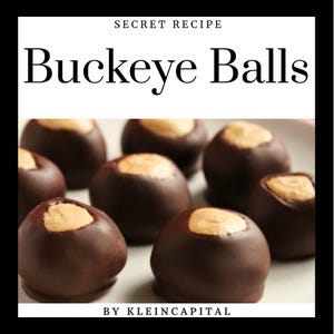 May include: Close-up of several Buckeye Balls, a chocolate and peanut butter confection. The dark chocolate coating surrounds a peanut butter center. The text "SECRET RECIPE" and "Buckeye Balls" are at the top, with "BY KLEINCAPITAL" at the bottom.