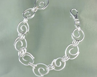 Crashing Waves Medium Weight Link Bracelet in Sterling Silver Handmade Spirals 7.5 inches Handcrafted by Peter Senesac