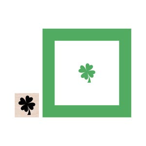May include: A green four-leaf clover inside a green square frame. The clover is a symbol of good luck.