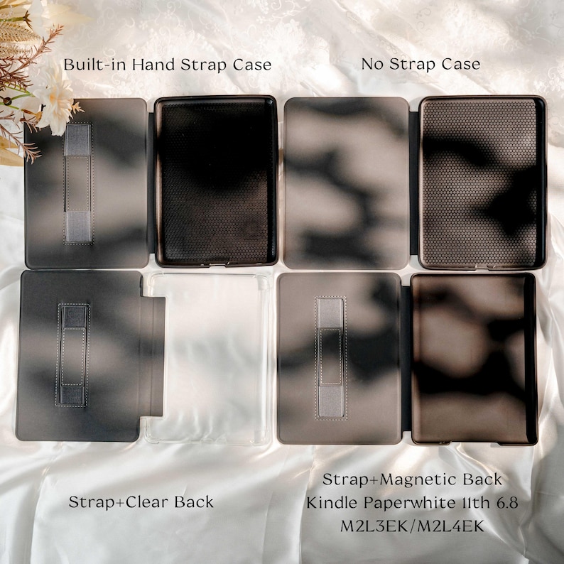 May include: Four e-reader cases displayed in a grid. Top left: Built-in Hand Strap Case. Top right: No Strap Case. Bottom left: Strap+Clear Back. Bottom right: Strap+Magnetic Back Kindle Paperwhite 11th 6.8 M2L3EK/M2L4EK. Each case features a dark interior.