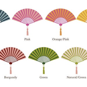 May include: A collection of eight hand fans in various colors, including blue, pink, orange/pink, yellow, burgundy, green, and natural/green. Each fan has a tassel and is labeled with its color.