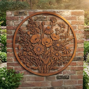 May include: A circular metal wall art piece featuring a laser-cut design of a wildflower bouquet. The artwork displays various flowers, including poppies and daisies, with stems and leaves arranged within a solid round frame in a rust-brown finish.