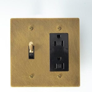 Toggle / Outlet combo plate - Aged Brass
