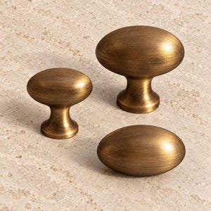 Egg-Shaped Brass Cabinet Knobs with Pedestal or Stemless Profiles