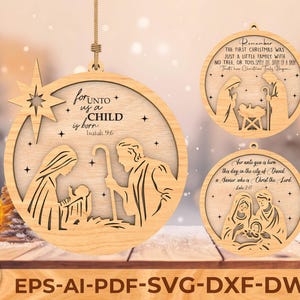 May include: Wooden Christmas ornaments with laser-cut designs. The ornaments feature biblical scenes, including the nativity and related text. The text includes the phrases "For unto us a child is born" and "Remember the first Christmas".
