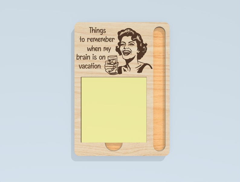May include: Wooden memo board with a retro illustration of a woman holding a drink, and the text "Things to remember when my brain is on vacation." Includes a yellow sticky note pad and a pen holder.